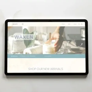 Photo of a tablet displaying a web page.